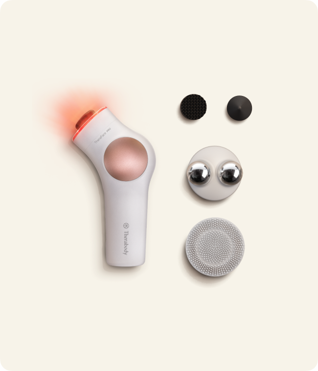 White Therabody TheraFace PRO multifunction facial device and attachments